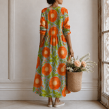 Coralie™ | Robe longue à grands motifs floraux naïfs et fond contrasté