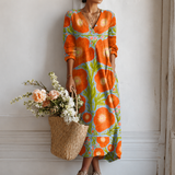Coralie™ | Robe longue à grands motifs floraux naïfs et fond contrasté