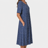Emelie | Sommerkleid mit Wildblumen-Print und Frontfältelung