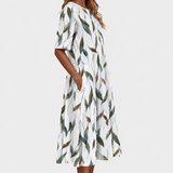 Adelina | Kleid mit Blumen-Zweigen-Print und A-Linie