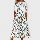 Adelina | Kleid mit Blumen-Zweigen-Print und A-Linie