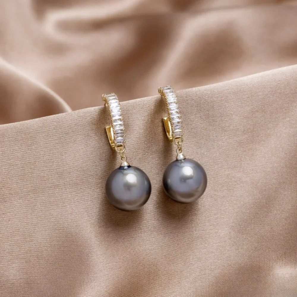 Boucles d'oreilles élégantes avec accents de perles