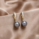 Boucles d'oreilles élégantes avec accents de perles