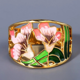 Bague rétro avec fleur en émail doré