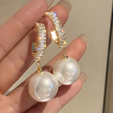 Boucles d'oreilles élégantes avec accents de perles