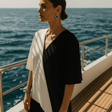 Boucles d'oreilles avec des pierres précieuses noires carrées