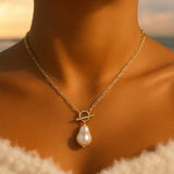 Collier avec pendentifs et perles