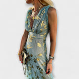 Robe fluide avec décolleté en V et détails en sequins