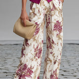 Rosa Pink ärmellose Weste und floral bedruckte weite Hosen Set