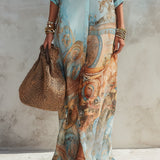 Urlaubsblaues Floralprint-Maxikleid
