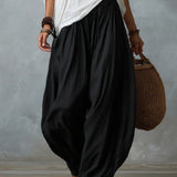 Weißes Off-Shoulder-Top und lockere Laternenhose Set