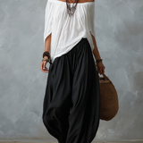 Weißes Off-Shoulder-Top und lockere Laternenhose Set